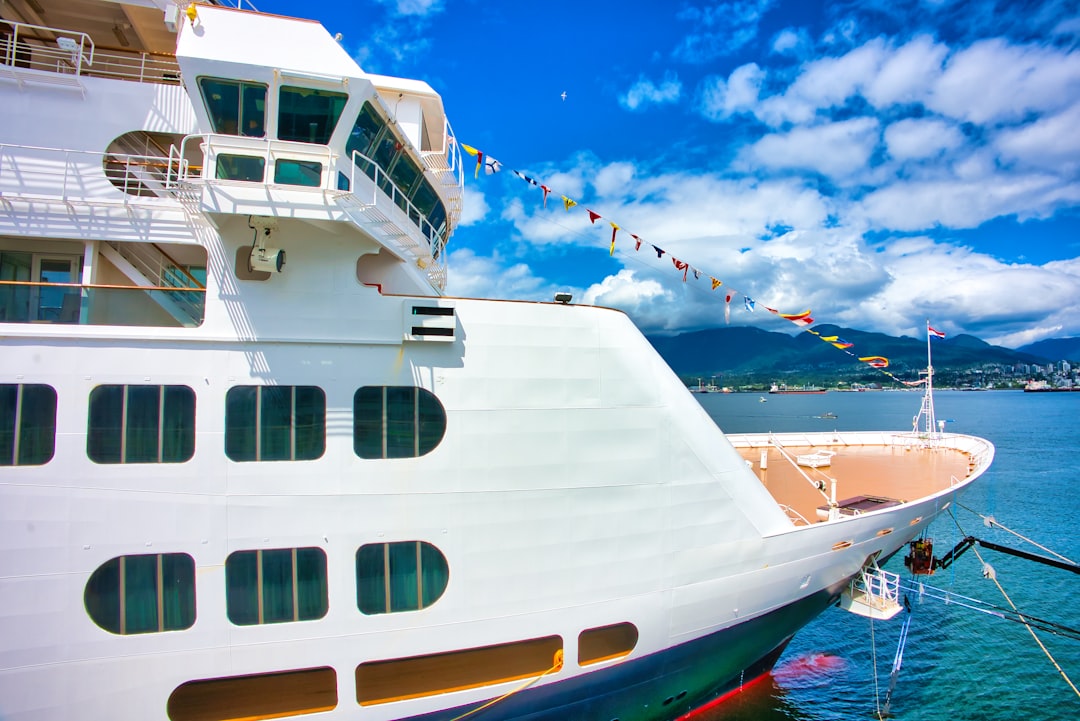 A cruise ship sails on a beautiful, sunny day.